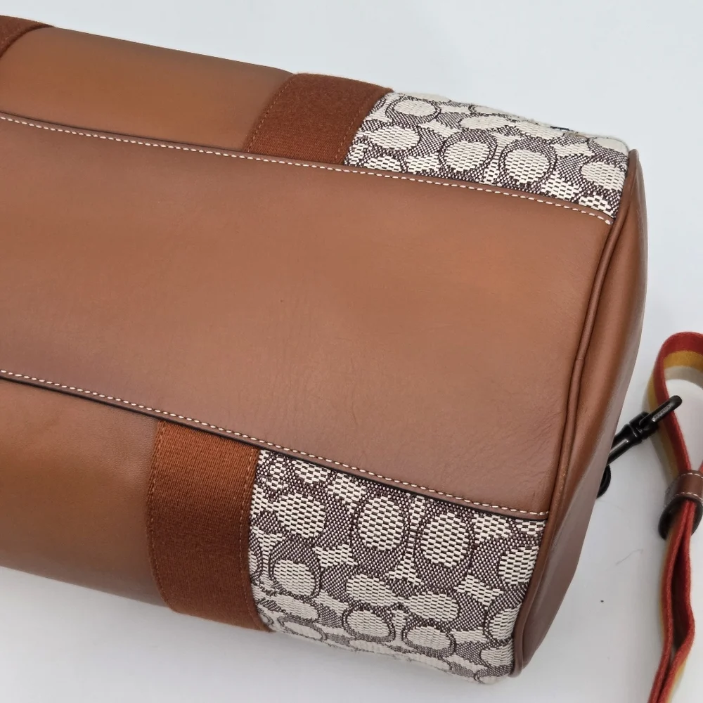 DISNEY X COACH DUFFLE BAG - SIGNATURE TEXTILE JACQUARD MICKEY MOUSE AND FRIENDS